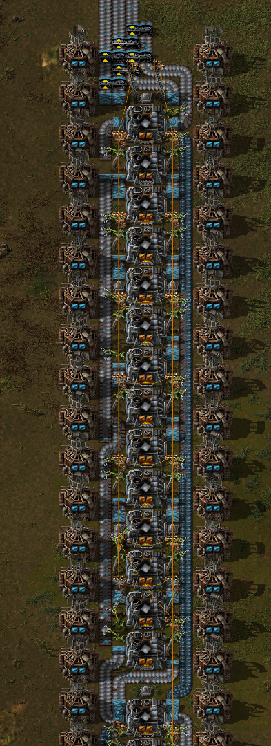 Top part of the 3 blue belt smelter array with modules and beacons